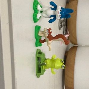 Three. Pack of kinder egg toys.